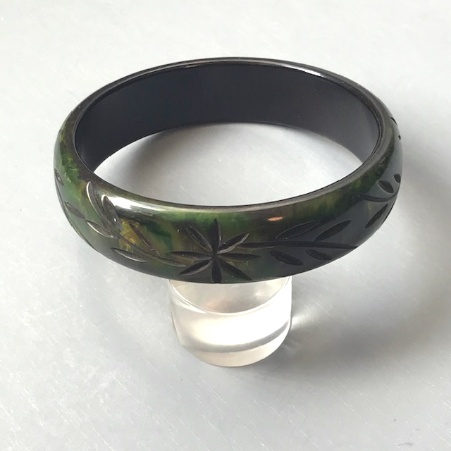 BAKELITE bangle in spinach green with flower and vine carving and black over-dye