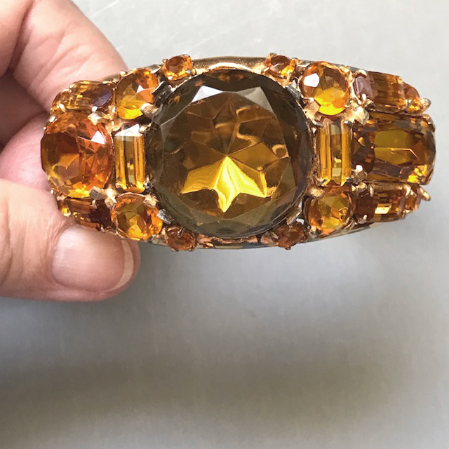 DEROSA bracelet with unfoiled topaz gold, brown and caramel colored rhinestones