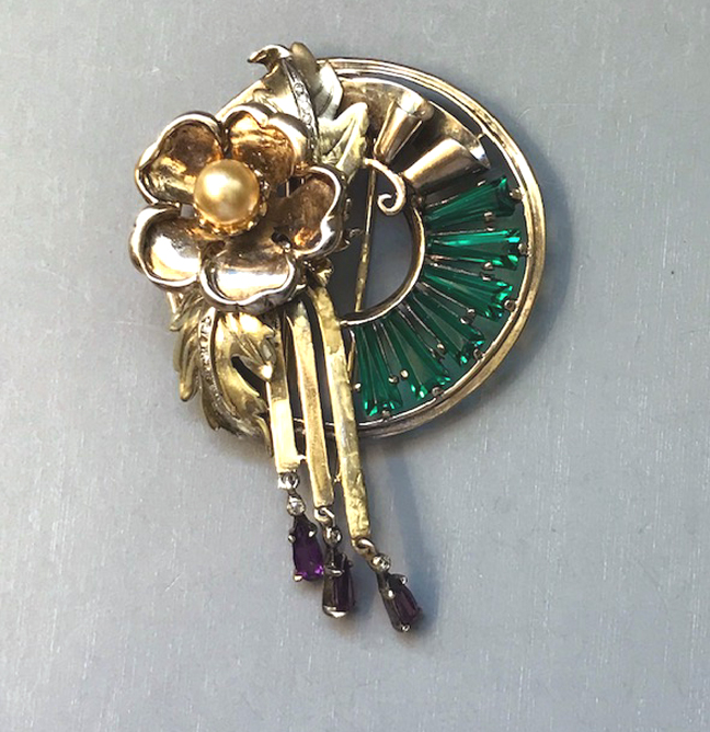 DEROSA gold washed sterling fur clip with an open rose flower with a glass pearl center, unfoiled long green rhinestones