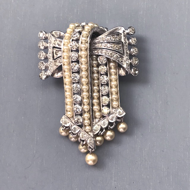 DEROSA bow fur clip with layers of brilliant clear rhinestones and glass pearl rows and dangles