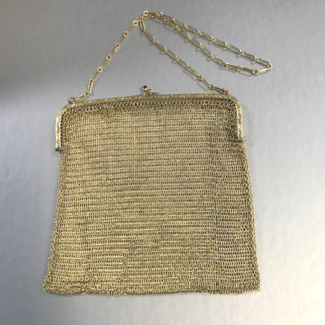 E A BLISS purse made of gold colored metal mesh with little blue glass tips