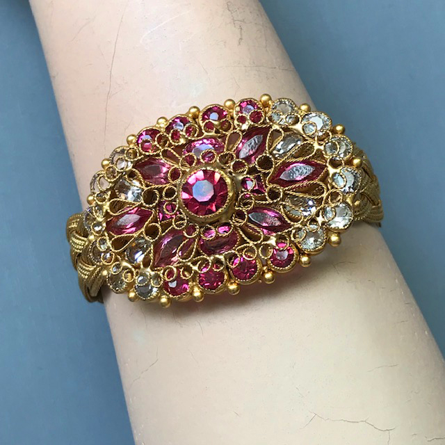ORIGINAL by ROBERT red, pink and clear unfoiled rhinestones bracelet in gold washed silver