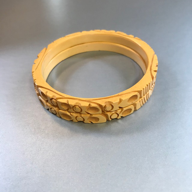 BAKELITE well carved maiden sized butterscotch bangles, set of 2