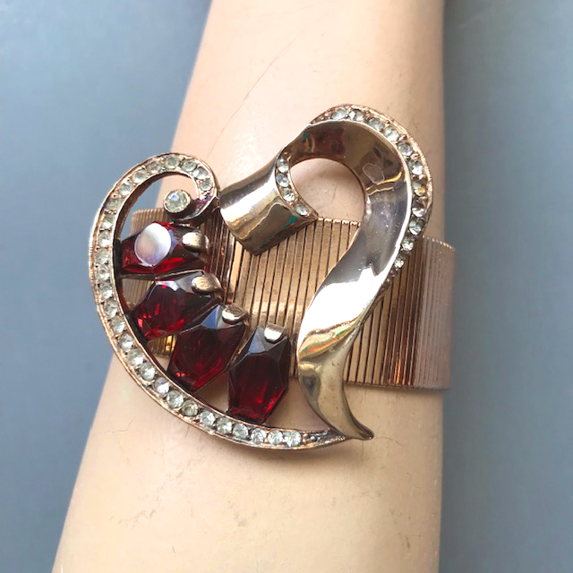 REJA attributed heart bracelet with ruby red and clear rhinestones