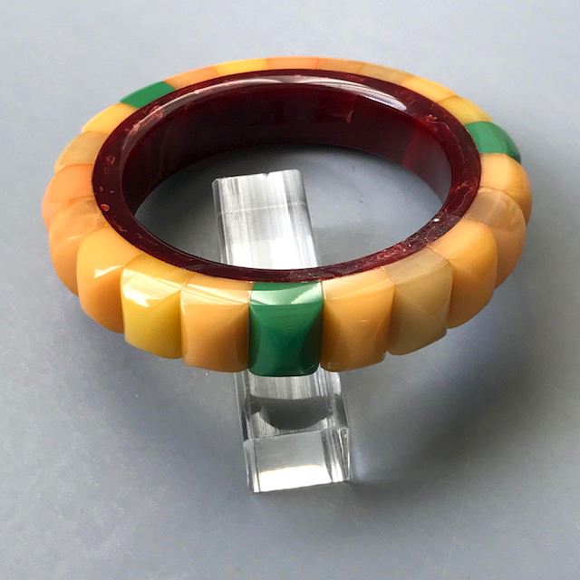 SHULTZ bakelite pastel and teal colored rods bangle with burgundy moon interior