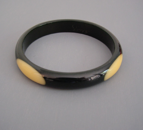 SHULTZ bakelite black spacer bangle with 4 butter yellow oval dots