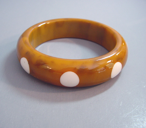 SHULTZ bakelite marbled caramel bangle with 8 white Lucite dots