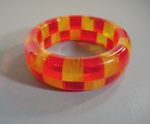 SHULTZ bakelite two row check bangle in transparent red and marbled yellow swirl