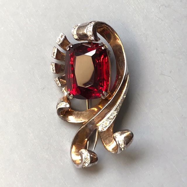 DEROSA gold washed sterling fur clip with large red center cushion rhinestone and tiny clear rhinestone accents