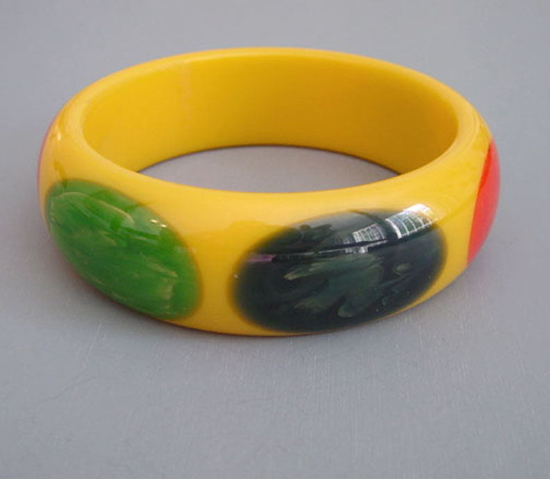 SHULTZ bakelite yellow bangle with red, blue and green Belle Kogan dots