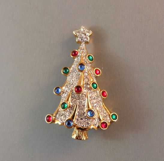SWAROVSKI 1996 Signature Collection Christmas tree brooch with clear rhinestone boughs, red, blue and green cabochon