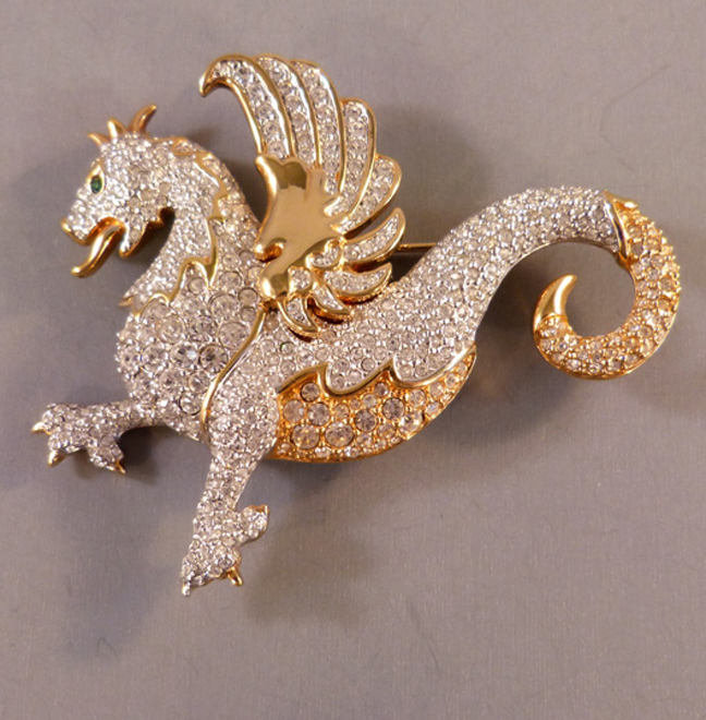 SWAROVSKI brooch of a winged figural hippocampus creature figure with clear rhinestone pave wings and body