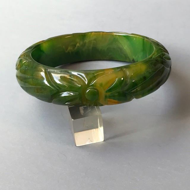 BAKELITE marbled green bangle with carved and tumbled flowers and leaves