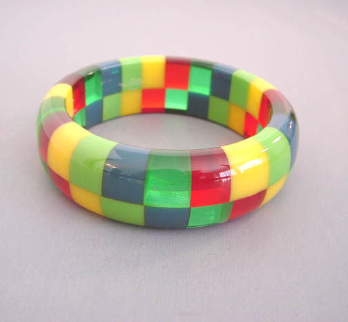 SHULTZ bakelite two row check bangle with transparent green and red and opaque green, blue and yellow