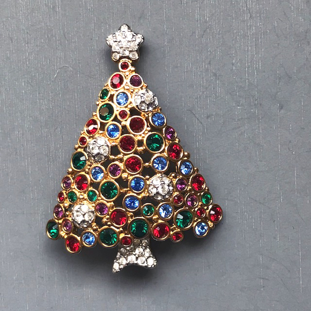 SWAROVSKI 1999 Christmas tree brooch with red, green and blue rhinestone boughs and clear rhinestone ornaments