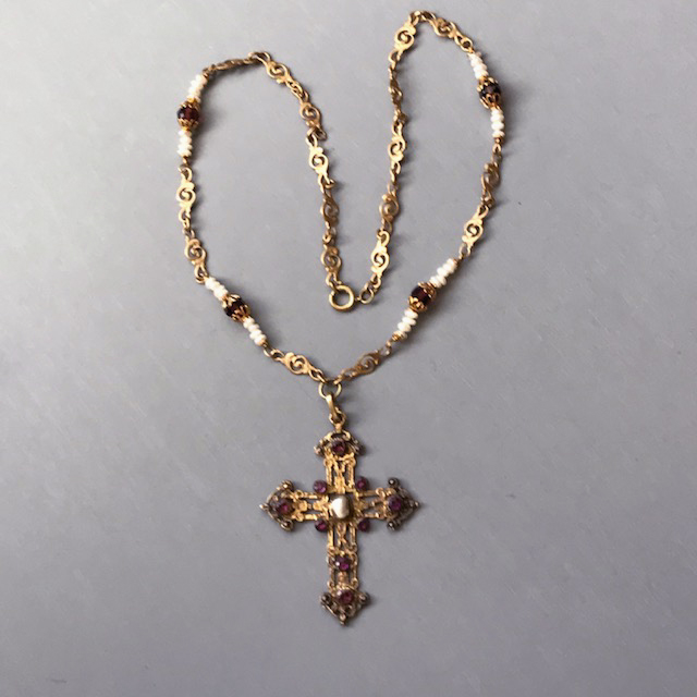 AUSTRO-HUNGARIAN Renaissance Revival cross pendant necklace of purple stones, a shell center, and a chain with alternating pearls and faceted purple glass beads