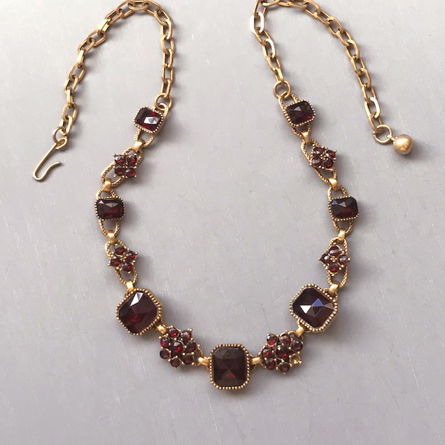 NECKLACE of garnet colored glass rhinestones necklace
