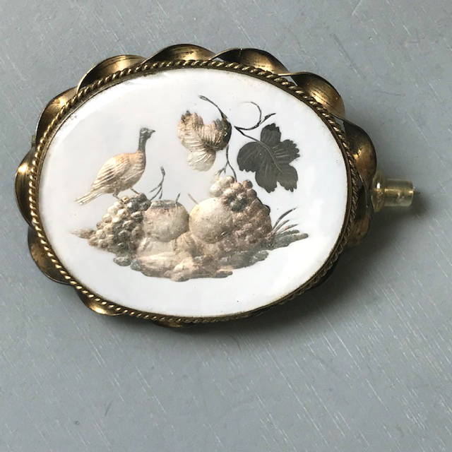 VICTORIAN brooch of a pheasant bird sitting with fruits and leaves