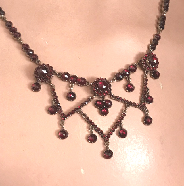 BOHEMIAN GARNET necklace with dangling garnets at the bottom of the design