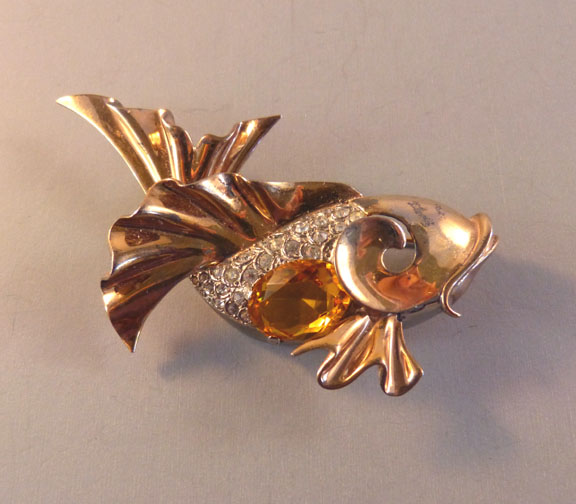 MB BOUCHER figural fish brooch in gold plated sterling with a topaz colored unfoiled rhinestone belly