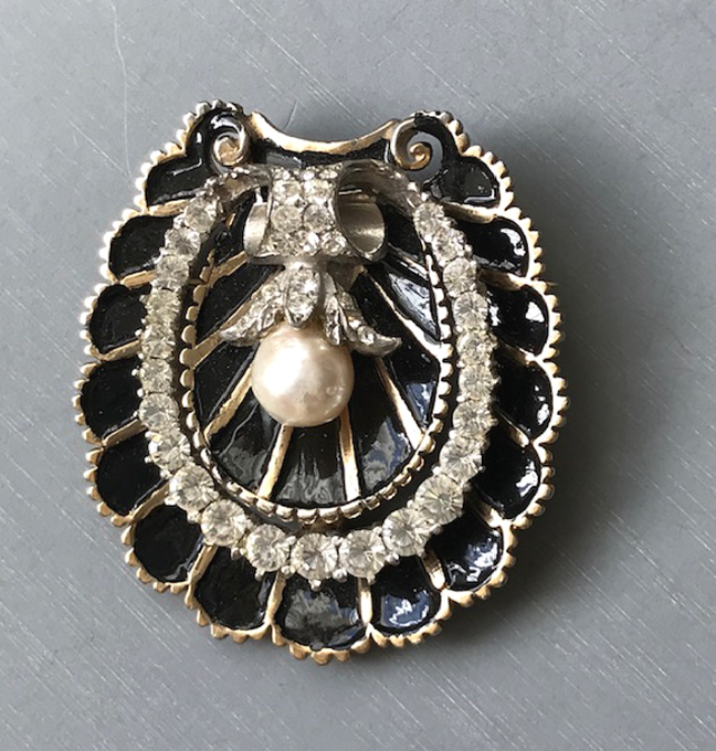 DEROSA seashell shaped black enameled brooch with glass pearls and clear rhinestones