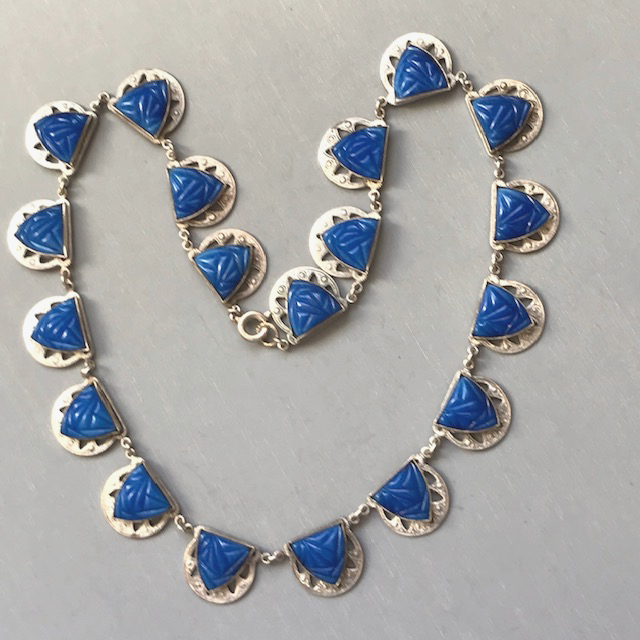 MODERNIST or Czech Deco necklace with blue segments with an interesting geometric pressed design