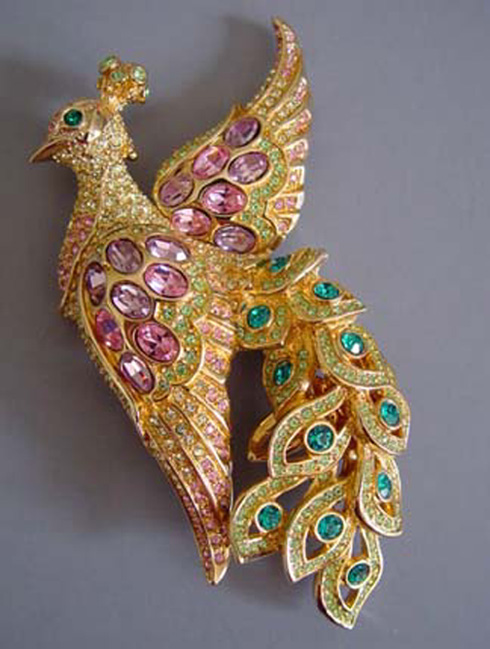 SWAROVSKI peacock figural brooch with pink, lavender, green and aqua rhinestones