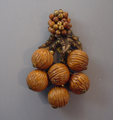 MIRIAM HASKELL Frank Hess carved walnuts dress clip with wood beads and antiqued gold tone leaves
