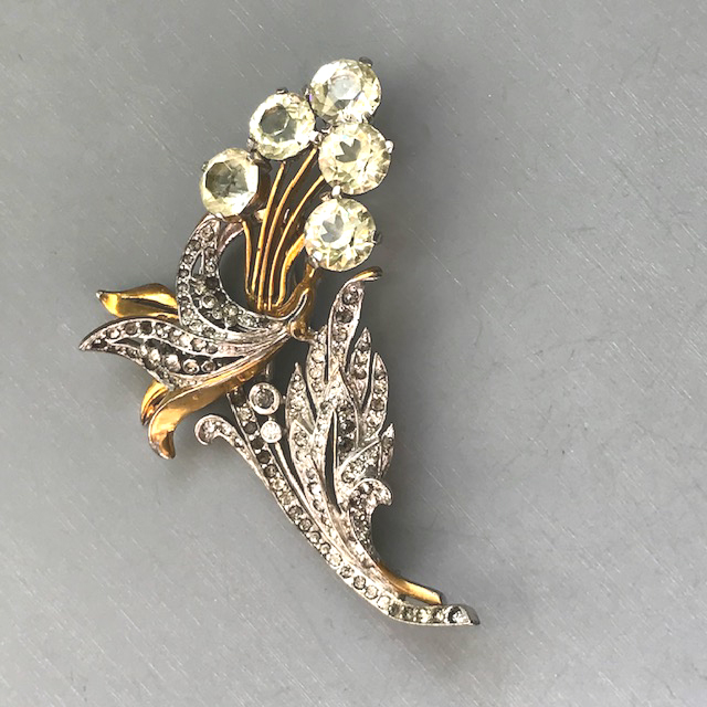 FLORAL brooch with very soft yellow unfoiled rhinestone flowers and clear foiled rhinestone leaves and accents