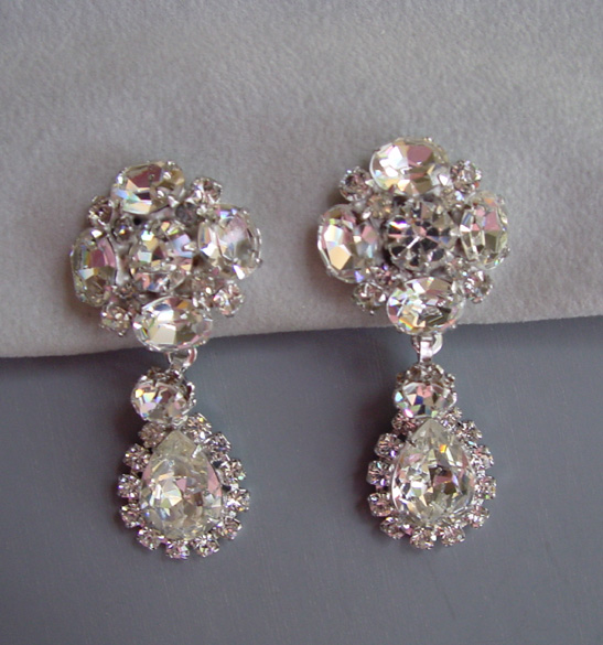 VENDOME clear rhinestone dangling pendant earrings set in silver tone