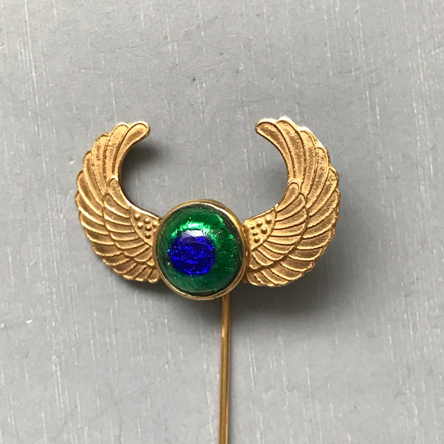 PEACOCK EYE 14 karat yellow gold  antique stick pin with curving wings on each side
