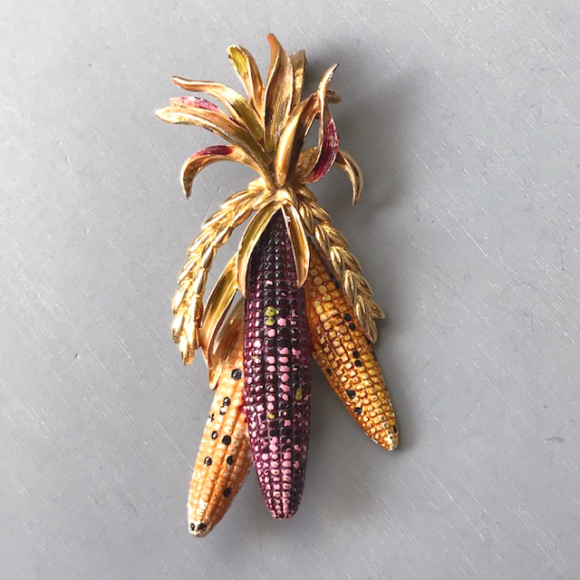 WEISS colorfully enameled Indian corn brooch in a textured gold tone