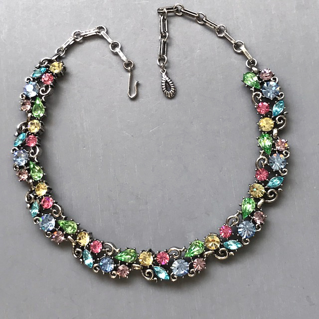 LISNER necklace with sparkling pastel color rhinestones in a gold tone setting