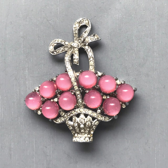 BASKET brooch with pink glass moonglow cabochons and clear rhinestones and with a cheerful bow on the basket handle