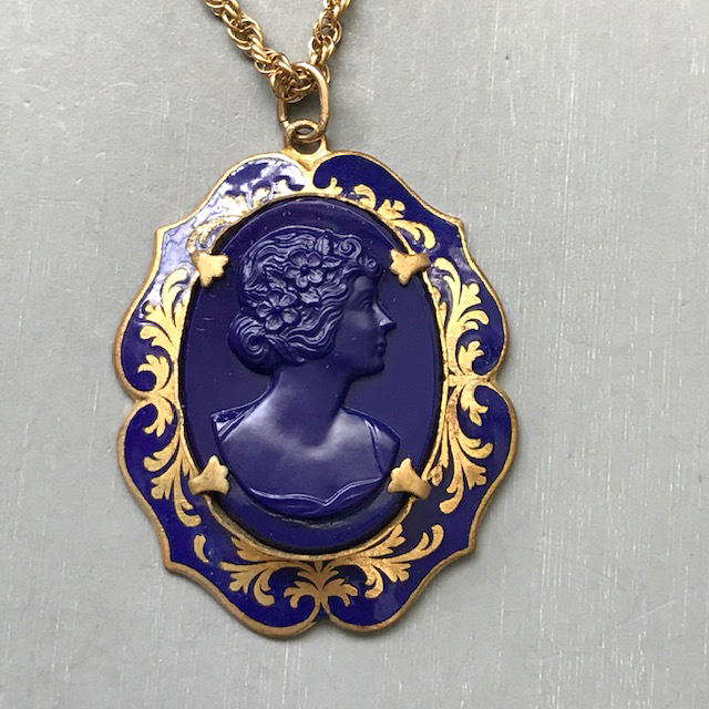 CAMEO cobalt blue glass cameo in a blue enameled setting over yellow gold
