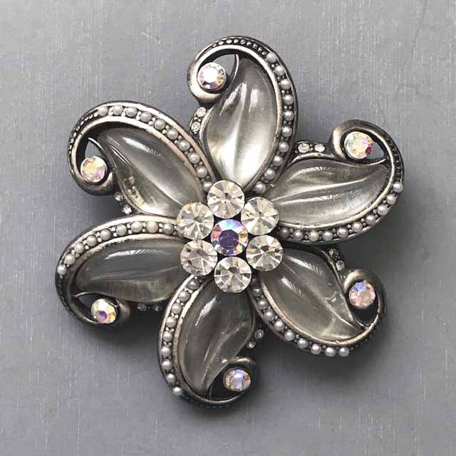 SWIRLING star brooch with clear molded resin petals, aurora borealis rhinestones and tiny glass pearls