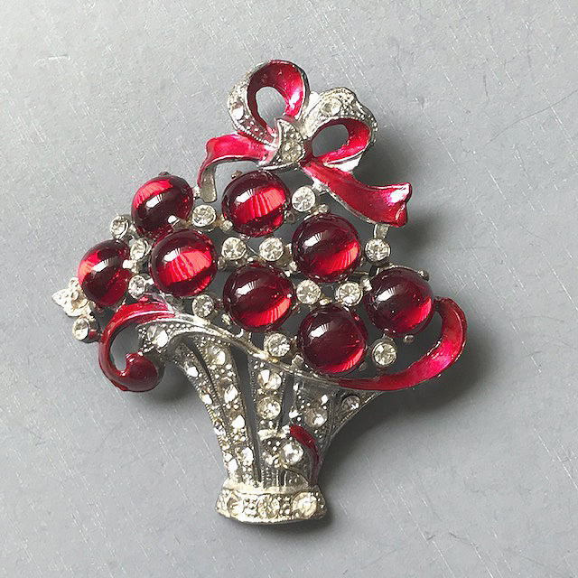 BASKET brooch with glowing red glass cabochons and a cheerful red enameled bow and trim with lots of clear rhinestones