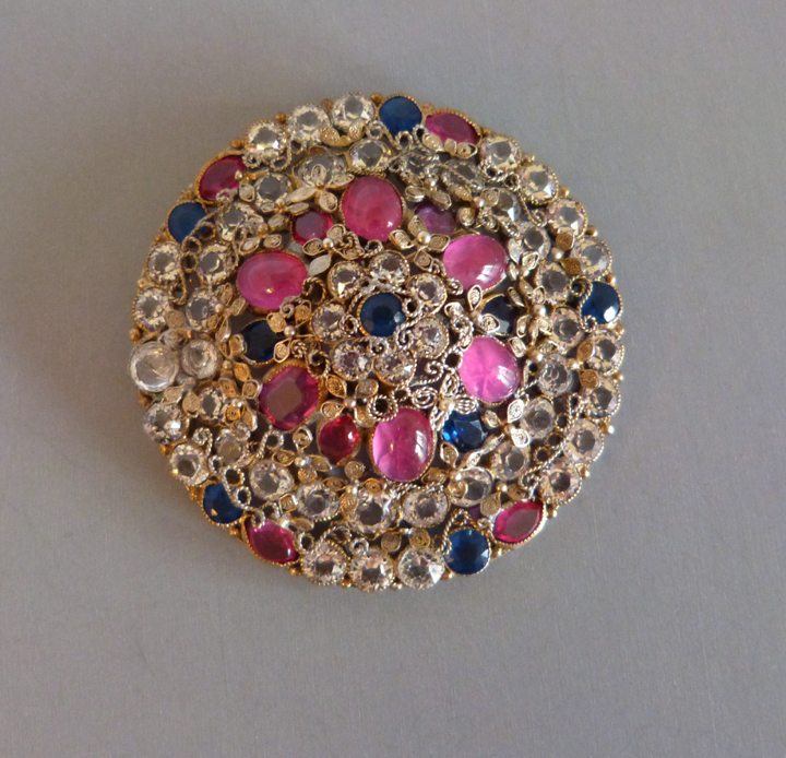HOBE brooch with rose cabochons and blue and clear unfoiled rhinestones set in gold plated silver hand wrought filigree