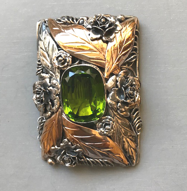 HOBE green rhinestone dress clip in sterling silver and yellow gold plating