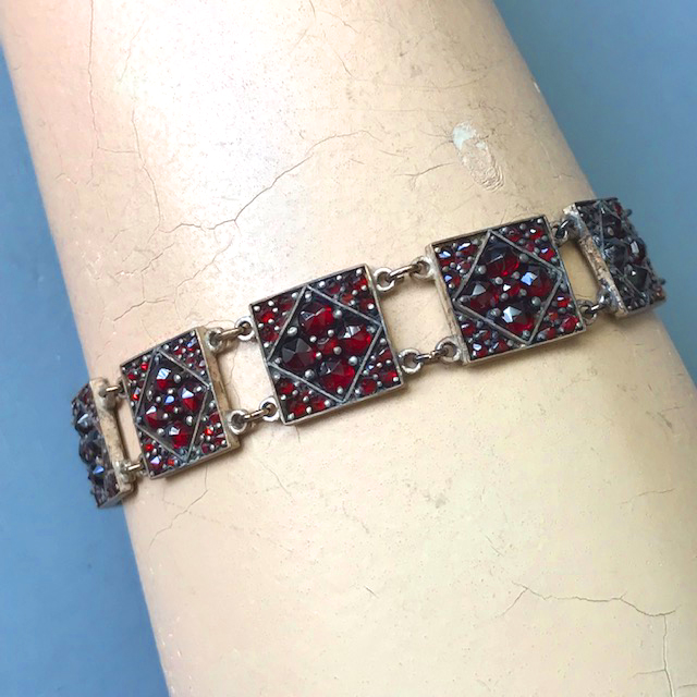 BOHEMIAN GARNET bracelet with 12 square links each encrusted with two sizes of prong set garnets