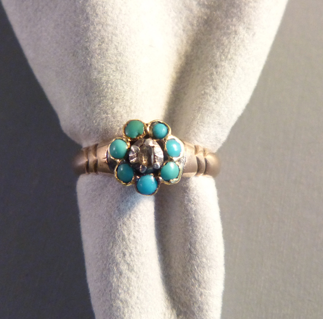 VICTORIAN antique 18 karat and turquoise ring with a diamond center