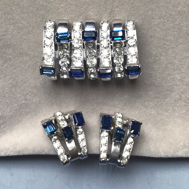 DEROSA very unusual brooch and earrings with dazzling sapphire blue and clear rhinestones in a rhodium plated sterling silver setting