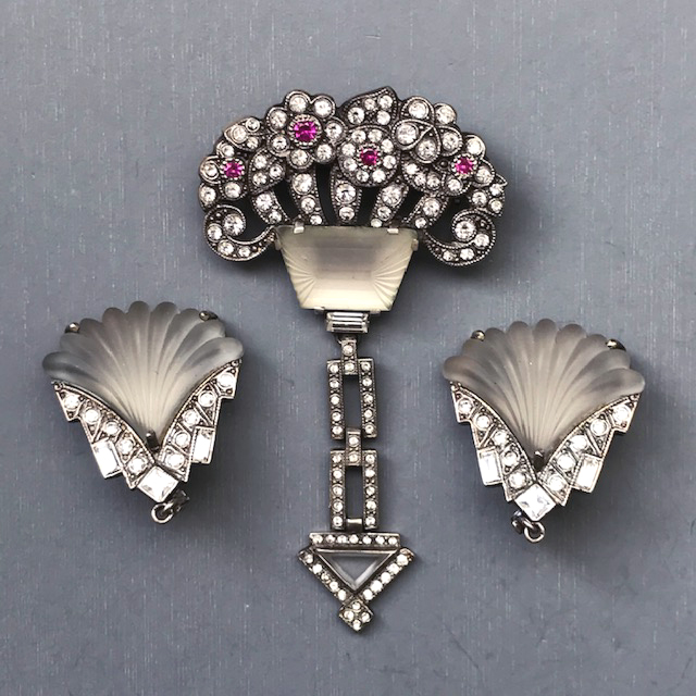 JAC Jorges Cohen brooch and earrings- sterling silver brooch with a frosted glass or rock crystal stone, a frosted rock crystal triangle, synthetic rubies and Swarovski crystals