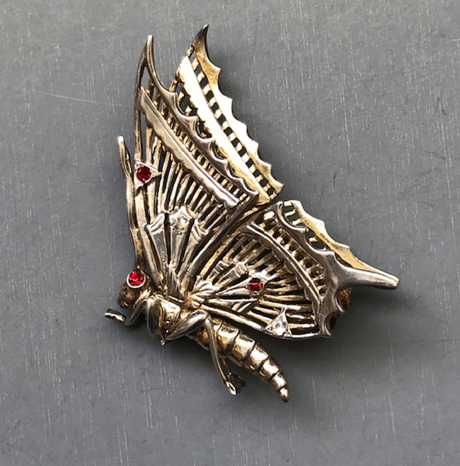 DEROSA gold plated sterling silver butterfly brooch with clear and red rhinestones