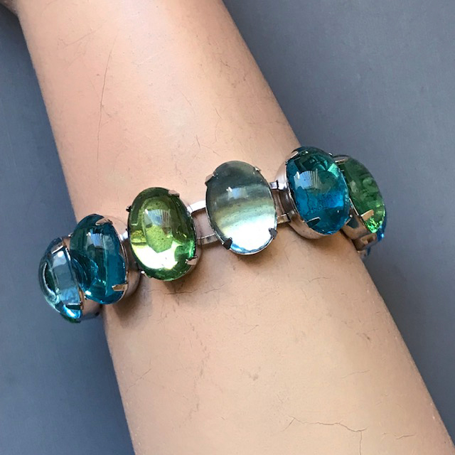 HATTIE CARNEGIE glowing aqua, blue and green glass cabochons bracelet