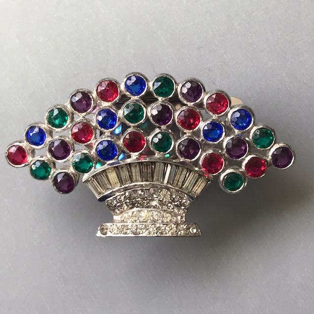 DEROSA basket dress clip with brilliant unfoiled red, purple, blue and green rhinestone stylized flowers in a silver plated basket