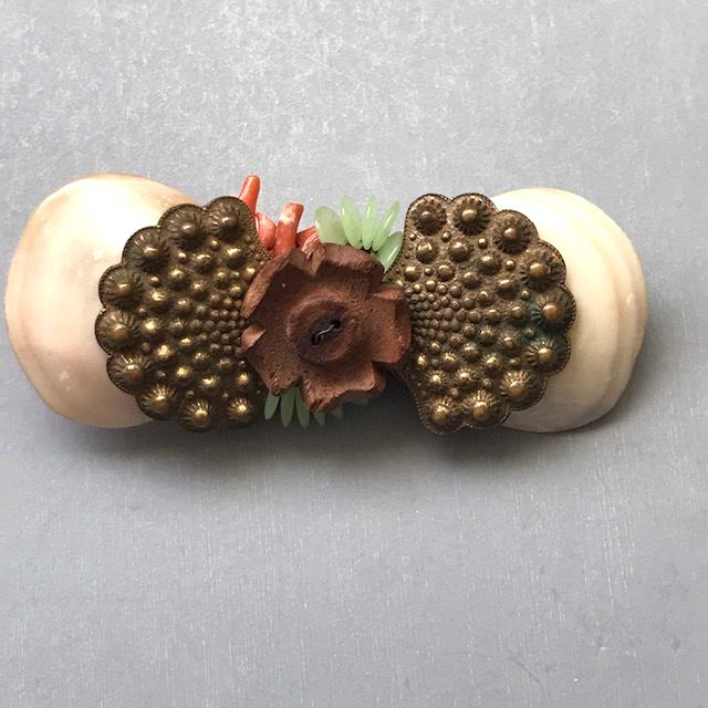 MIRIAM HASKELL by Frank Hess double sea shell brooch with carved wood flower, jade green glass beads, stick coral