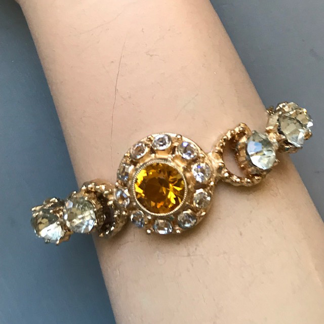 HOBE bracelet with brilliant honey topaz color and clear rhinestones, snap-back hinges on two sides