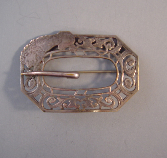 VICTORIAN silver tone metal sash pin in buckle motif with a roaring lion in the design