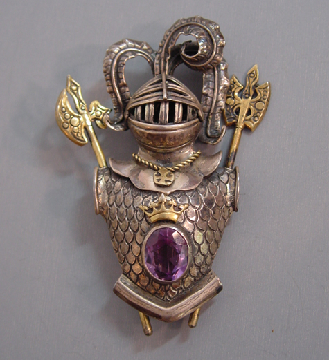 KNIGHT in armor brooch with a purple amethyst set in 800 silver accented with 9 karat yellow gold